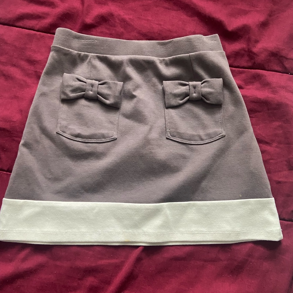 Cute skirt with two pockets in front (pretty short) FROM FRANCE